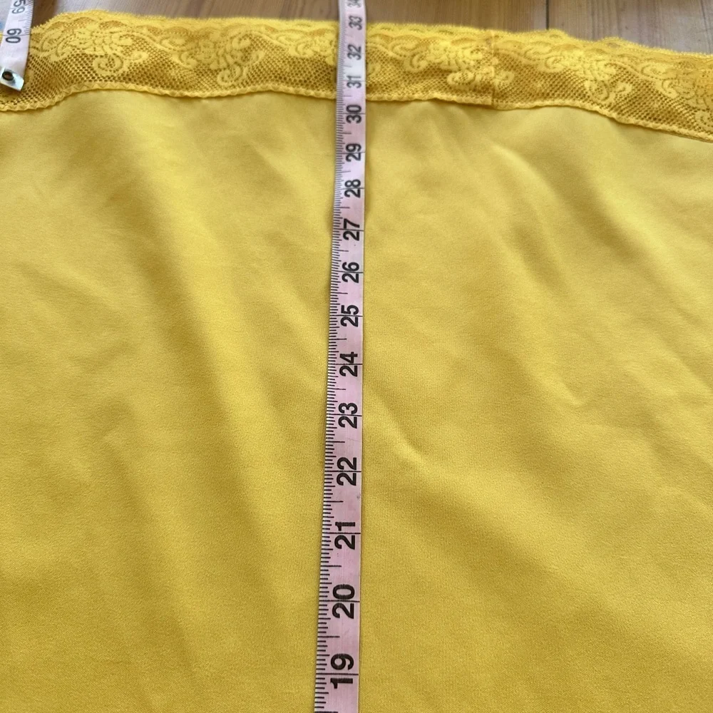 Vintage round yellow tablecloth with lace trim